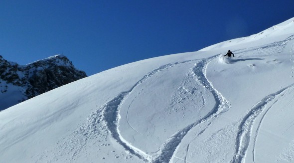 Lisi getting fresh tracks skiing the Mehlsack, Lech am Arlberg